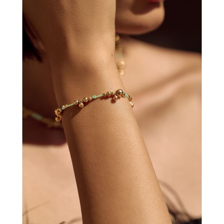 Bracciale su cordoncino menta con sfere dorate  - 1