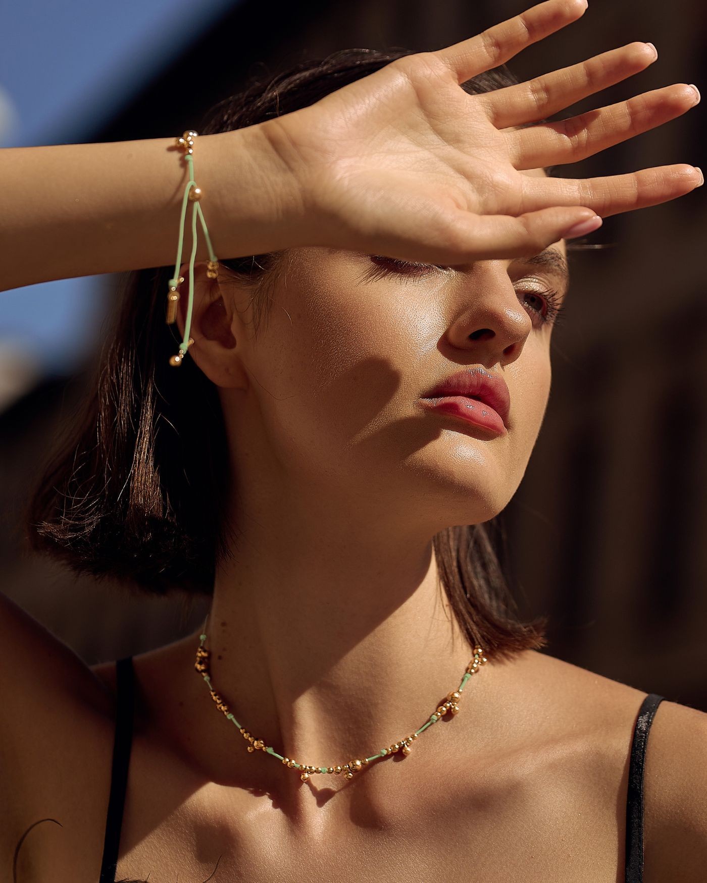 Necklace on mint cord with gold-gilded beads  - 1