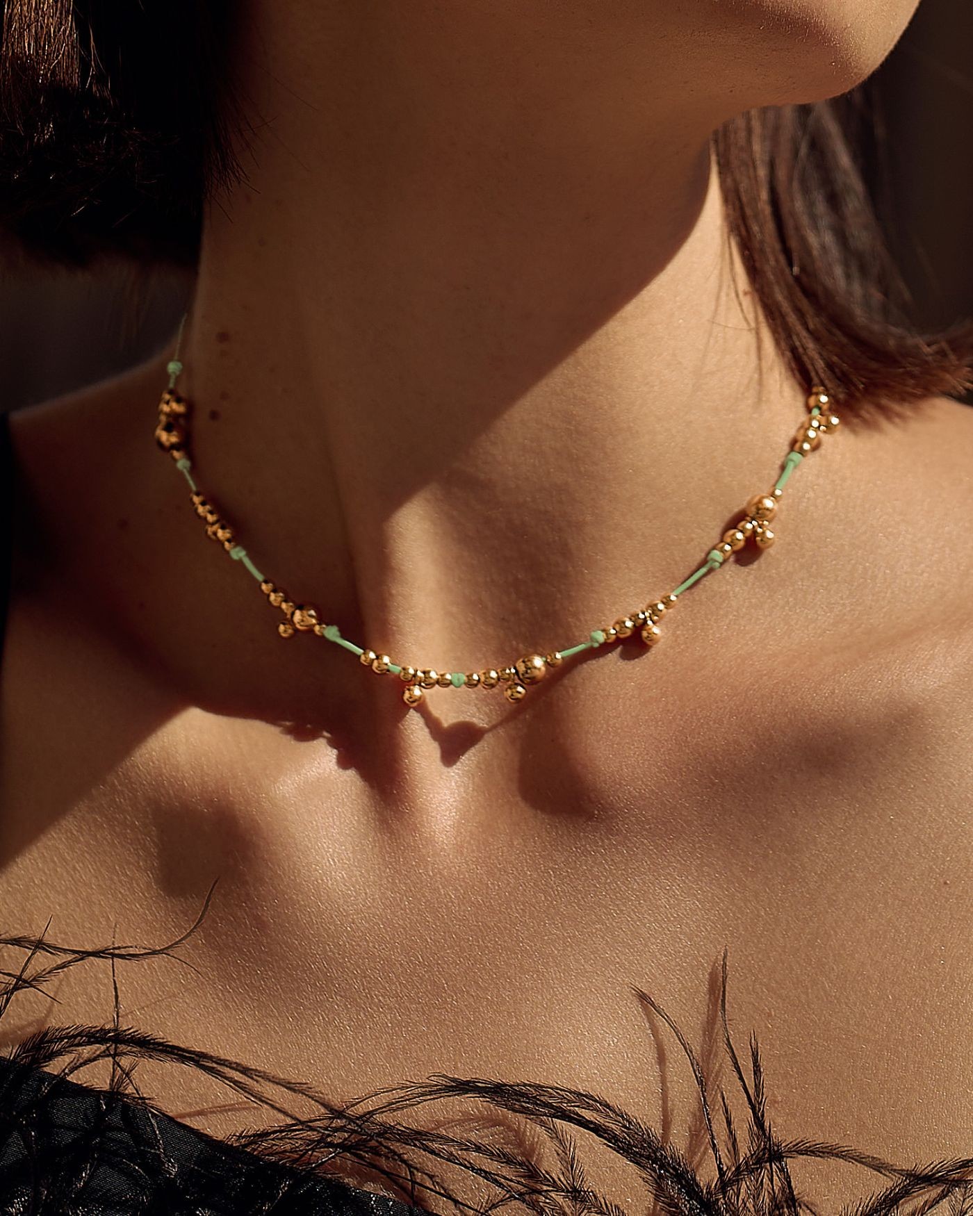 Necklace on mint cord with gold-gilded beads  - 4