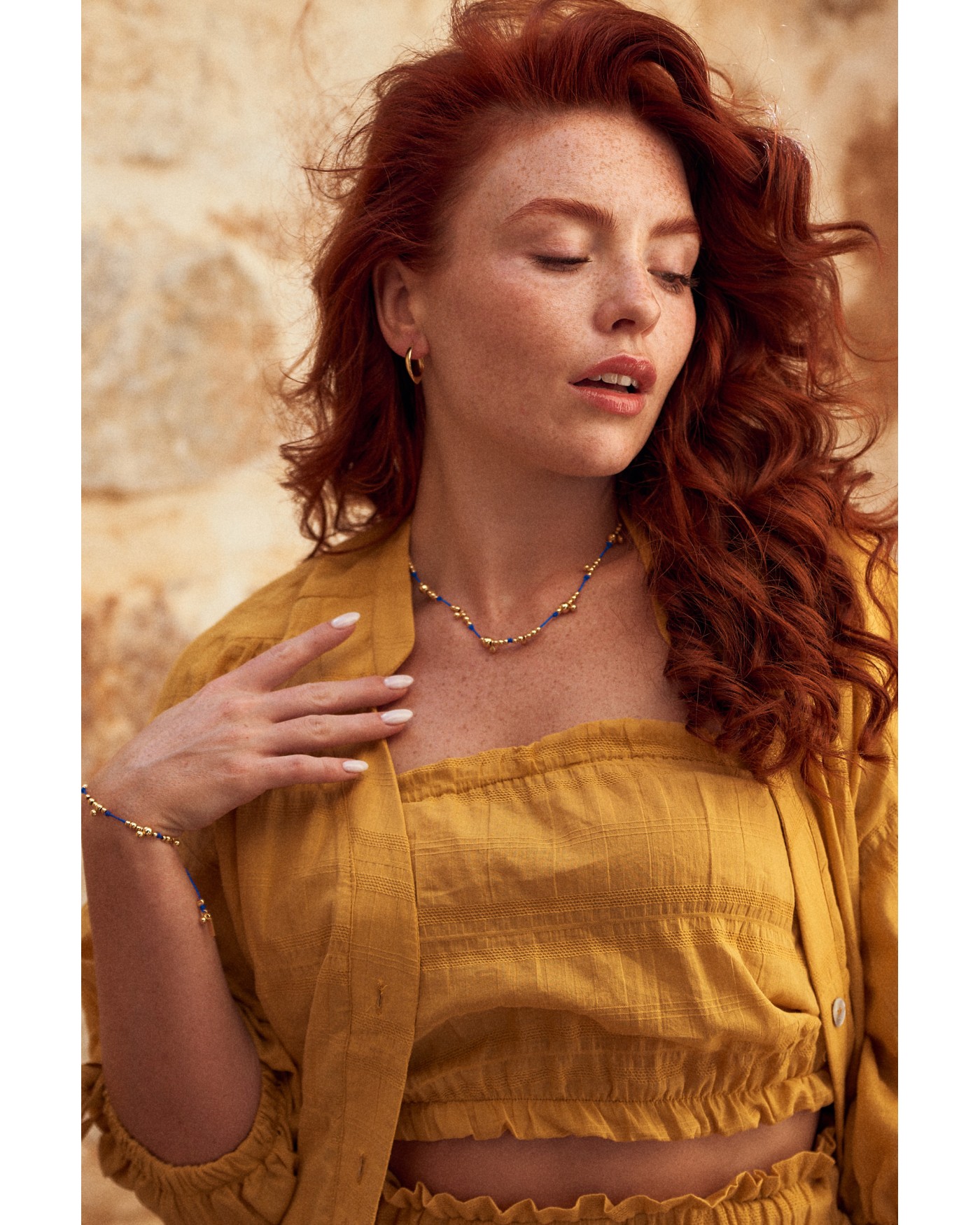 Necklace on blue cord with gold-gilded beads  - 1